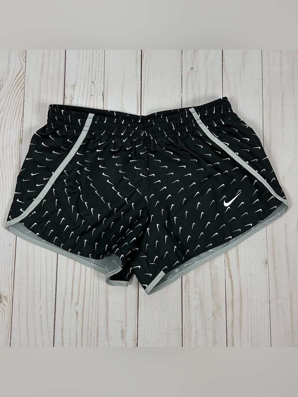 NIKE girl's Dri-Fit black & white Printed Swoosh running shorts - size small